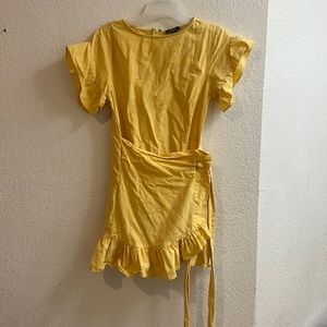 Yellow dress with ruffles